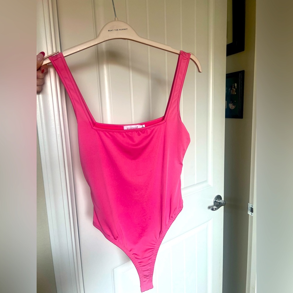 Barbie pink body suit